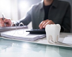 Patient in Rolling Meadows budgeting for cosmetic dentistry