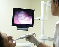 Dentist capturing intraoral photos