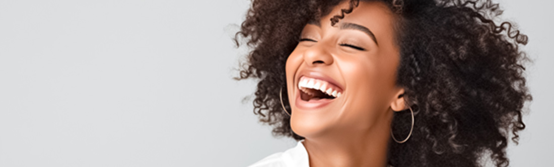 Woman with straight teeth smiling