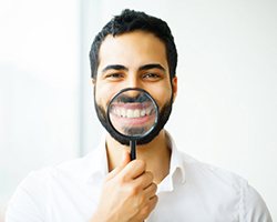 man smiling with dental crown and bridge in Rolling Meadows