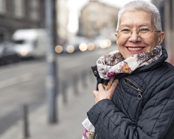 patient smiling after getting dental implants in Rolling Meadows