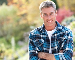 Man smiling outside