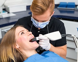 Dental patient undergoing digital impression scan
