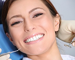 woman smiling in the dental chair 