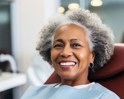 Mature, smiling female dental patient