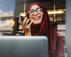 person standing outside and smiling