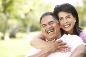 couple smiling in park