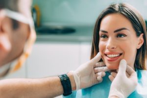 woman smiling at the dentist