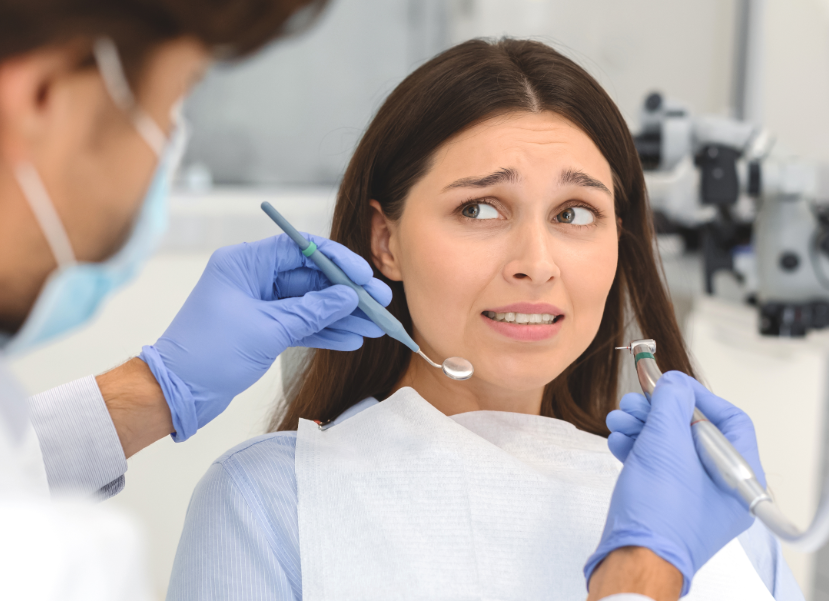 Patient looking scared at dentist
